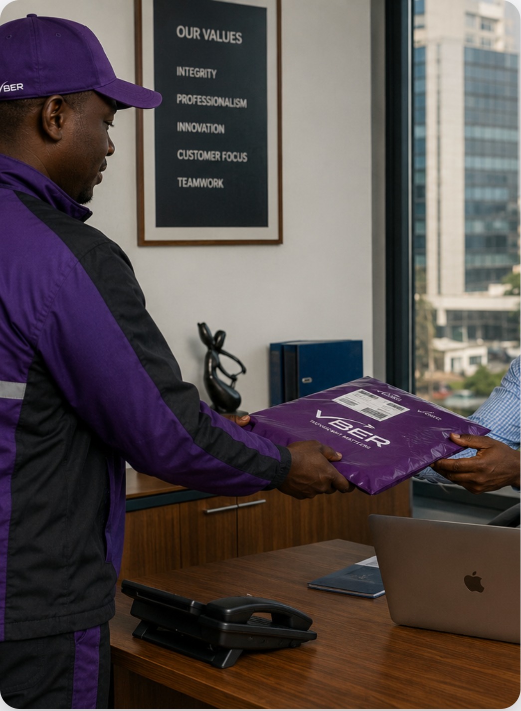 VBER courier handing over a crimson package inside a corporate office